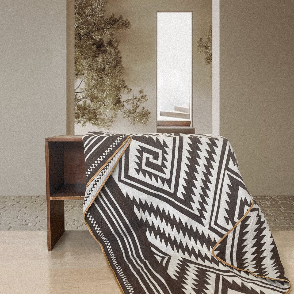 Brown El Paso Throw Blanket extended over furniture