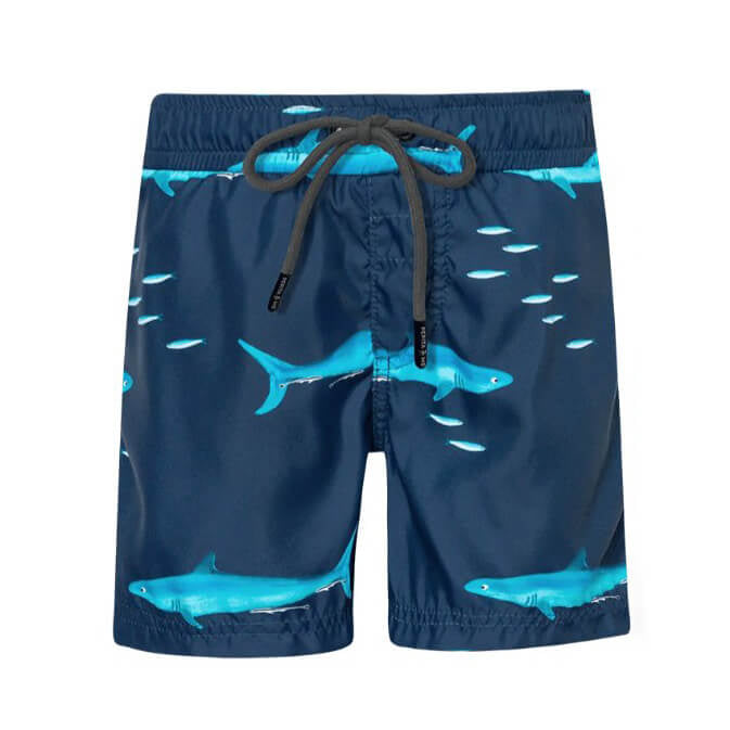Blue boys swim shorts with a black drawstring and cute remora fish design. The shorts are displayed over a white background. 