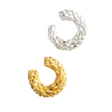 Image of two earcuffs. One in gold and another in silver. The purpose of this image is to highlight the earcuffs by Alma Jewelry. 