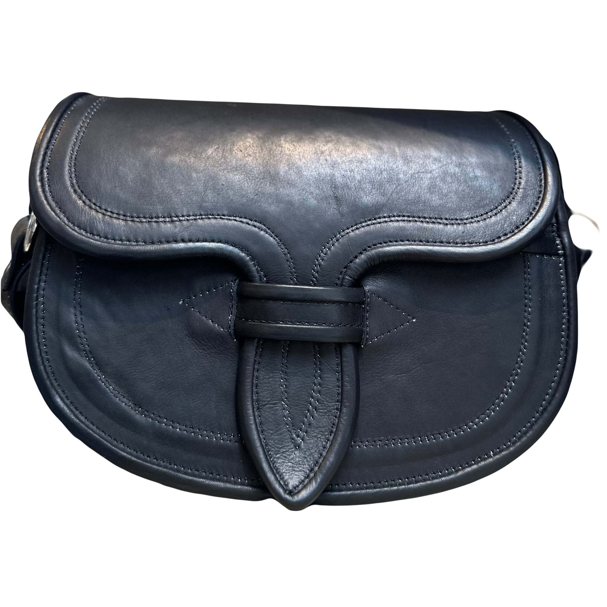 Oversized carriel crossbody bag in black. It is a semi round bag with intricate stitching. It is displayed over a white background.