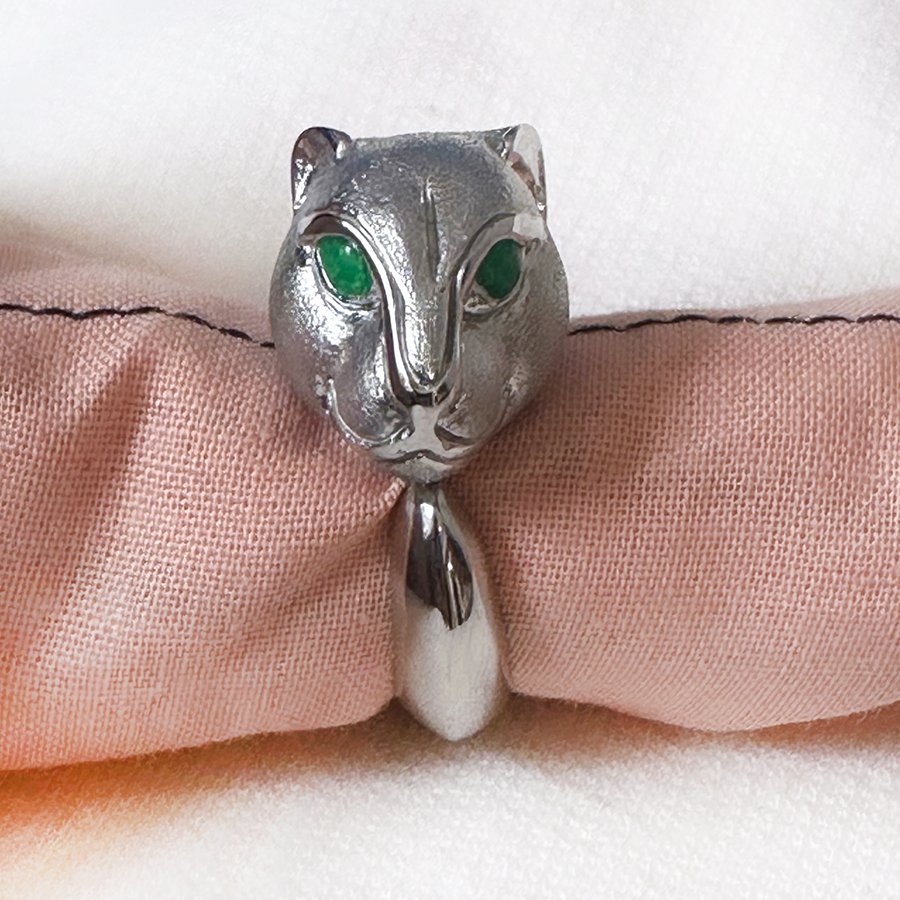 Testa di Pantera Ring by Eleonora Varini - Silver ring with a panther's head and green eyes.