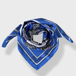The Zodiac Scarf for Aquarius wrapped as if around neck but pictured on white background.