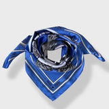 The Zodiac Scarf for Aquarius wrapped as if around neck but pictured on white background.