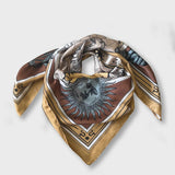 Zodiac Scarf for Leo. Image of fierce lion over astrological background, moon and sun details, in golden tone. Scarf wrapped on surface as if on neck. 