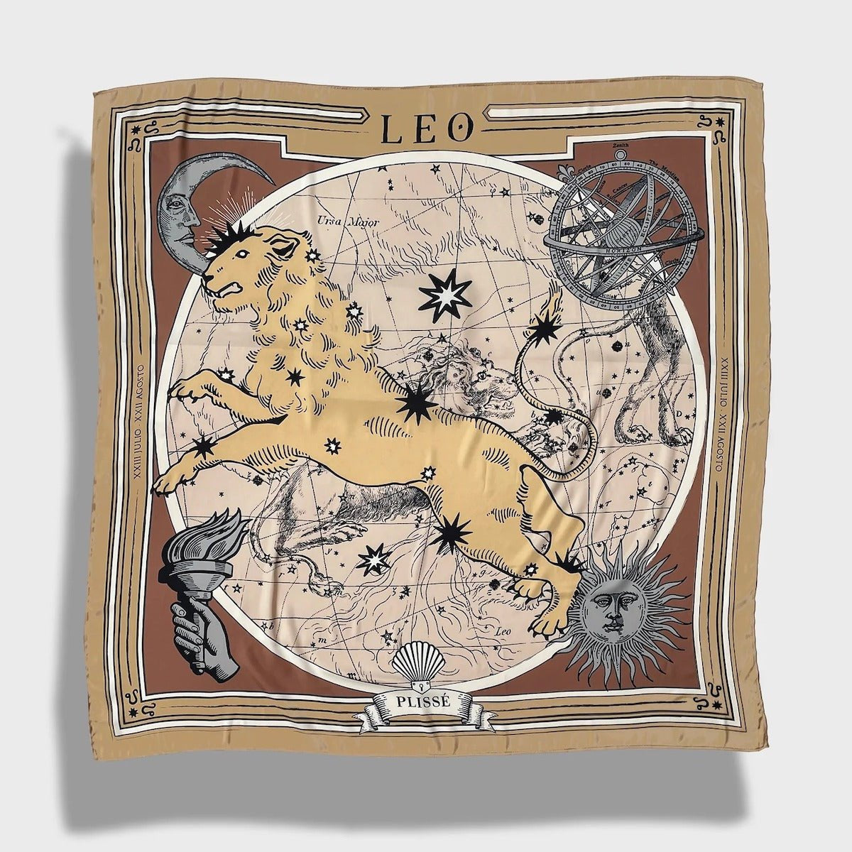 Zodiac Scarf for Leo. Image of fierce lion over astrological background, moon and sun details, in golden tone. Scarf on plain white background. 