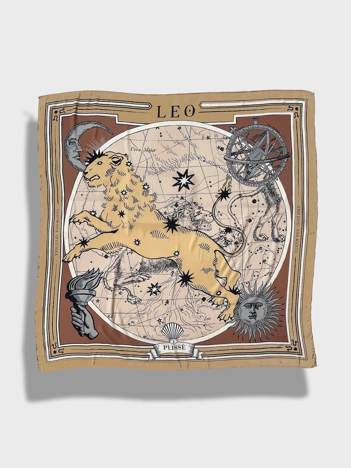 Zodiac Scarf for Leo. Image of fierce lion over astrological background, moon and sun details, in golden tone. Scarf on plain white background. 