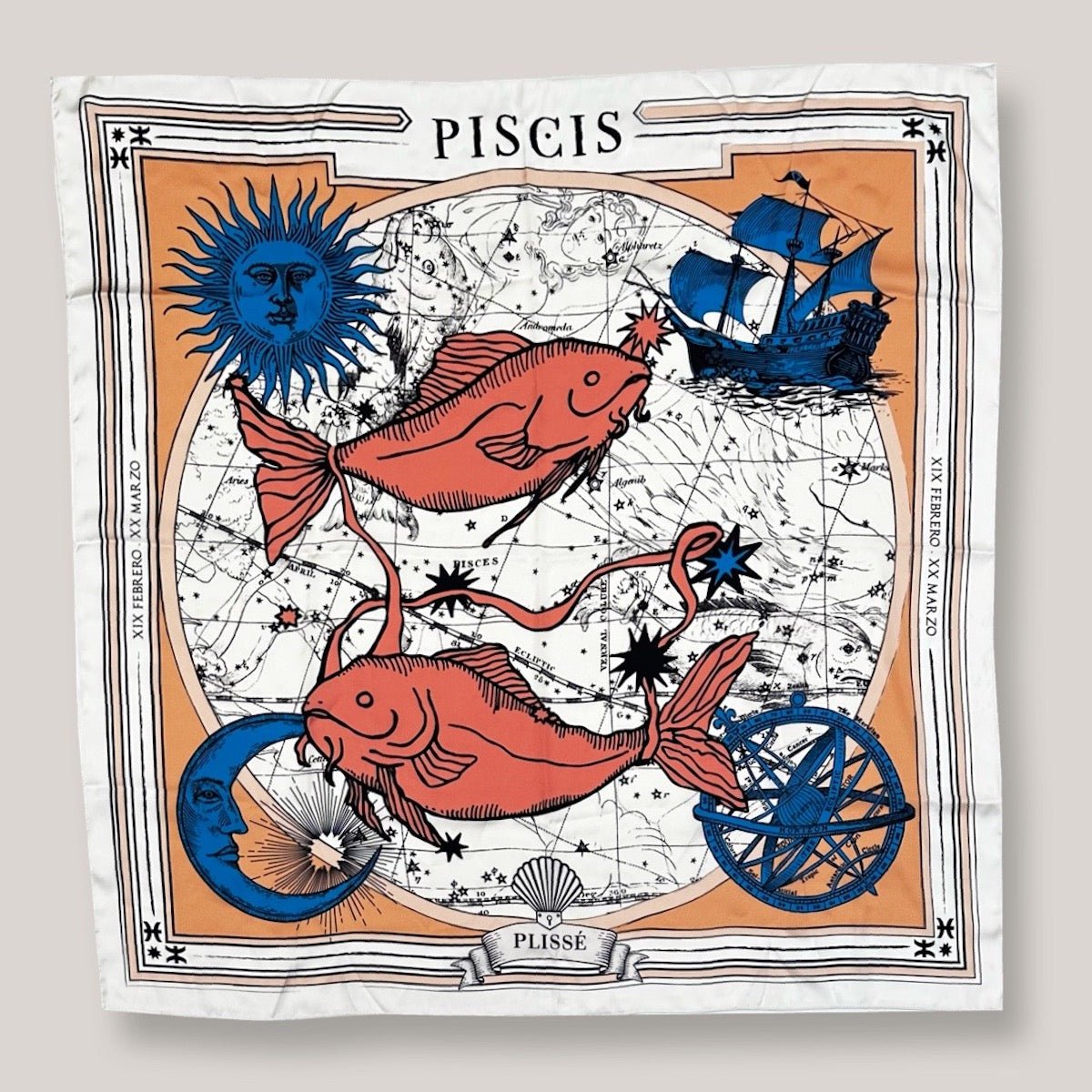 Zodiac Scarf for Pisces made by Plissé. Image of  two fish swimming in opposite directions. It is on top of a astrological background. Details of a dark blue ecliptic, sun, moon, and a boat. The scarf is a white with orange and blue details displayed on top of a plain white background.