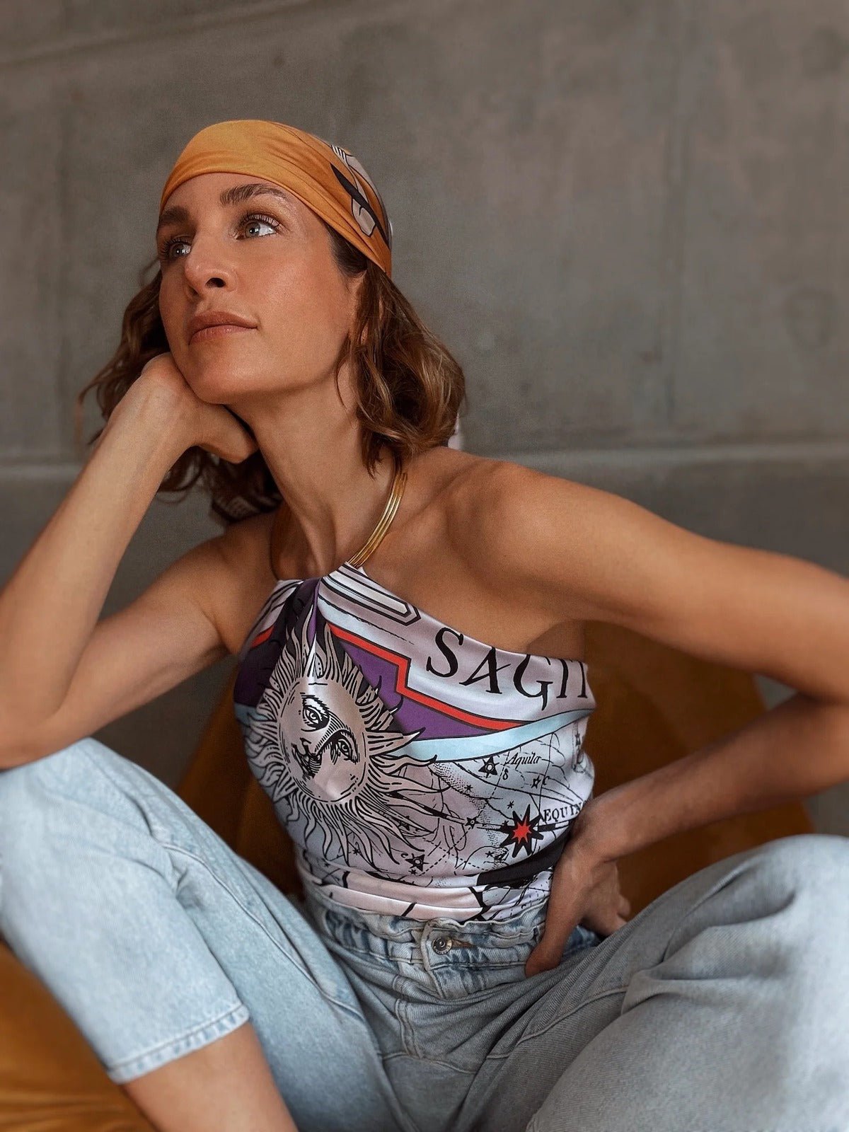 Woman wearing Zodiac Scarf for Sagittarius as top