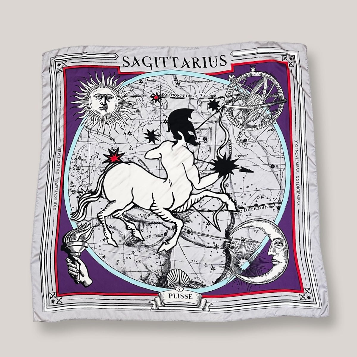 Zodiac Scarf for Sagittarius. Image of Archer, Sun, Moon, and astrological background with deep purple tones. Scarf on plain white background