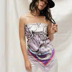Woman modeling Zodiac Scarf for Sagittarius as strapless top on white background