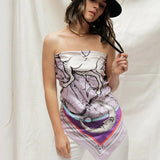 Woman modeling Zodiac Scarf for Sagittarius as strapless top on white background